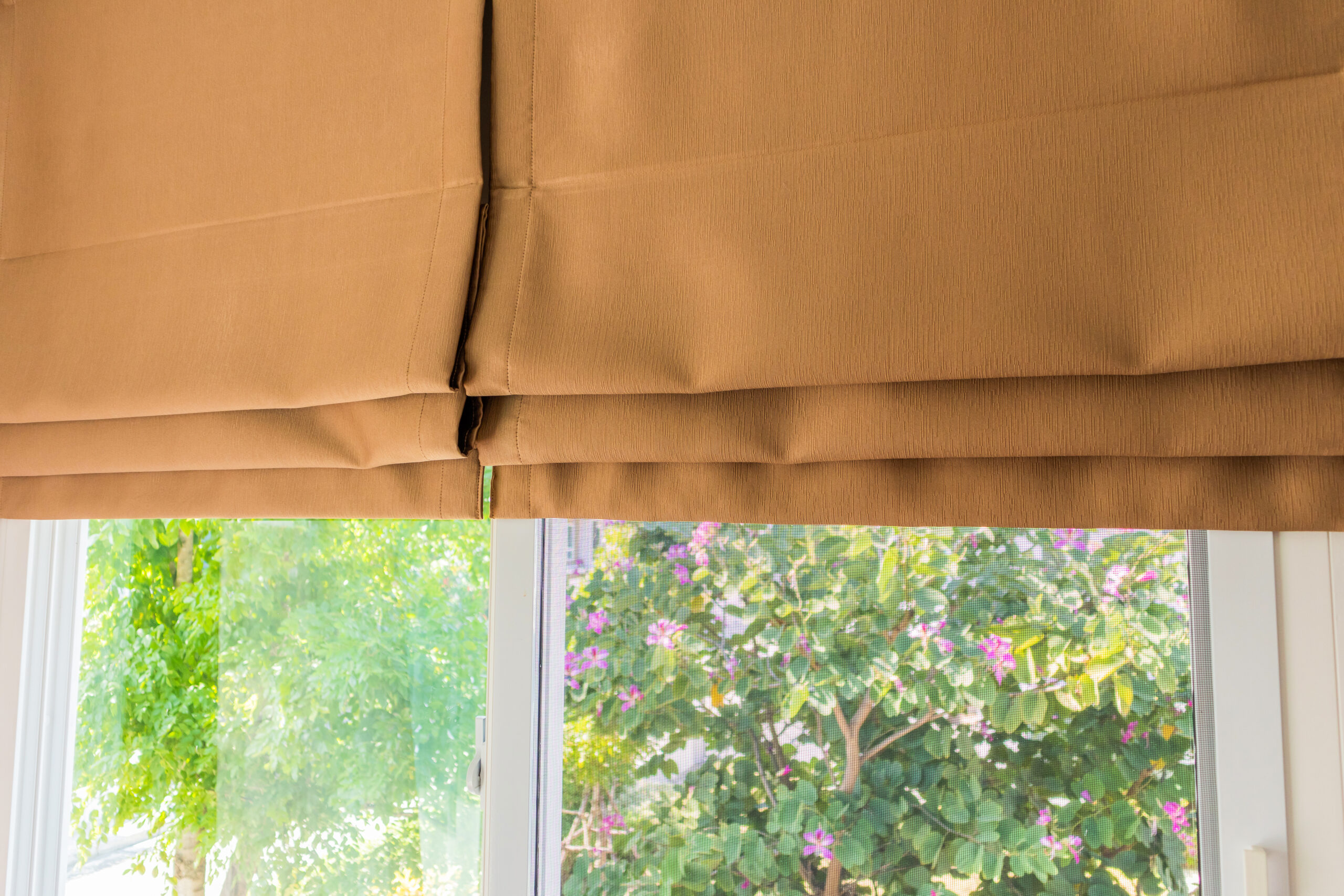 Roman blind curtain decoration in living room interior