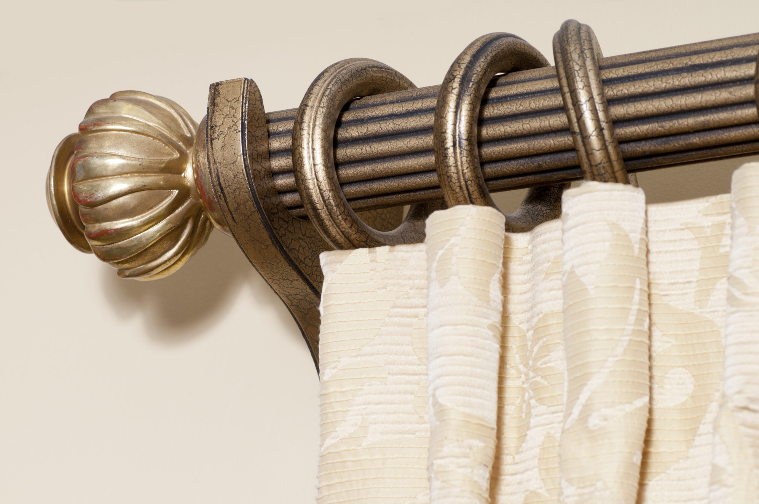 "Closeup of a designer curtain rod and drape in a furnishings store.Click below for more in this series, plus all of my furnishings and retail images:"