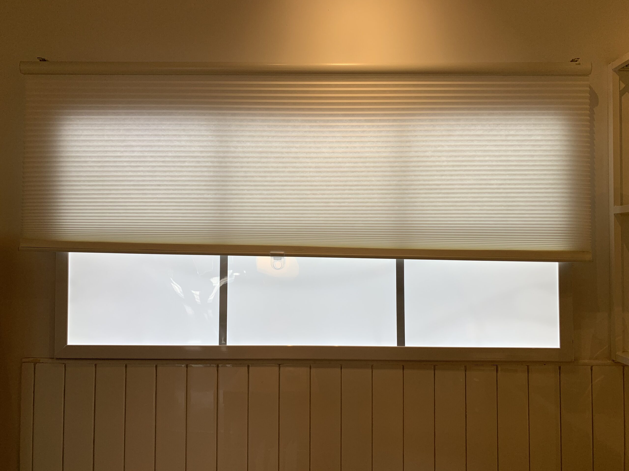 White Pleated Window Shade with Frosted Glass Window