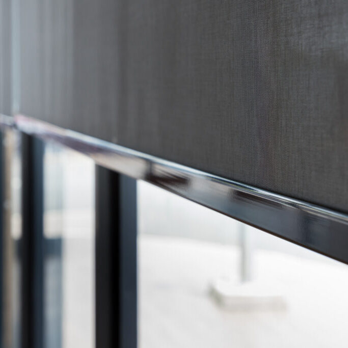 blind curtain or black blinds Roller sun protection in office.