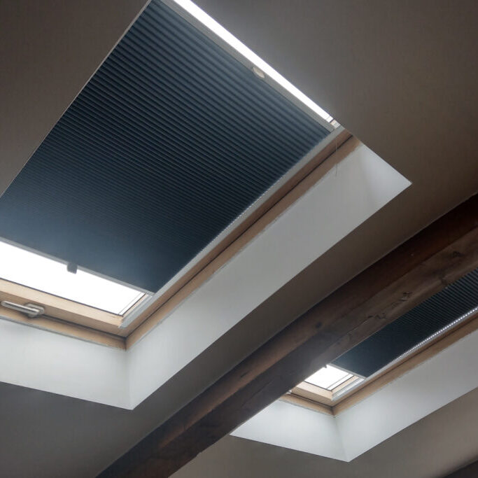 View of the windows in the roof of the house. More light in the room