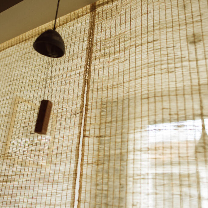 Japanese style curtains and wind chimes.